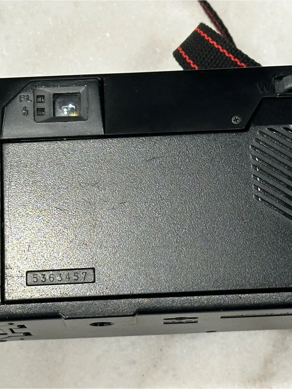 Pentax Black Point-and-Shoot Film Camera with Red-Trim Strap